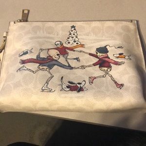 Coach small Charlie pouch with skelly design